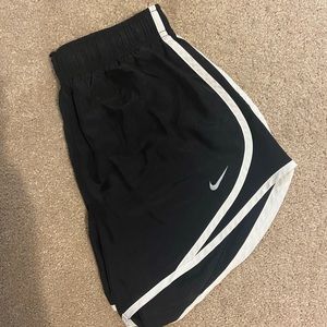 Black with white piping Nike running shorts